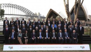 Central Bank Governors and Finance Ministers of G20 countries pose for a family picture near the Sydney Opera House and Sydney Harbour Bridge